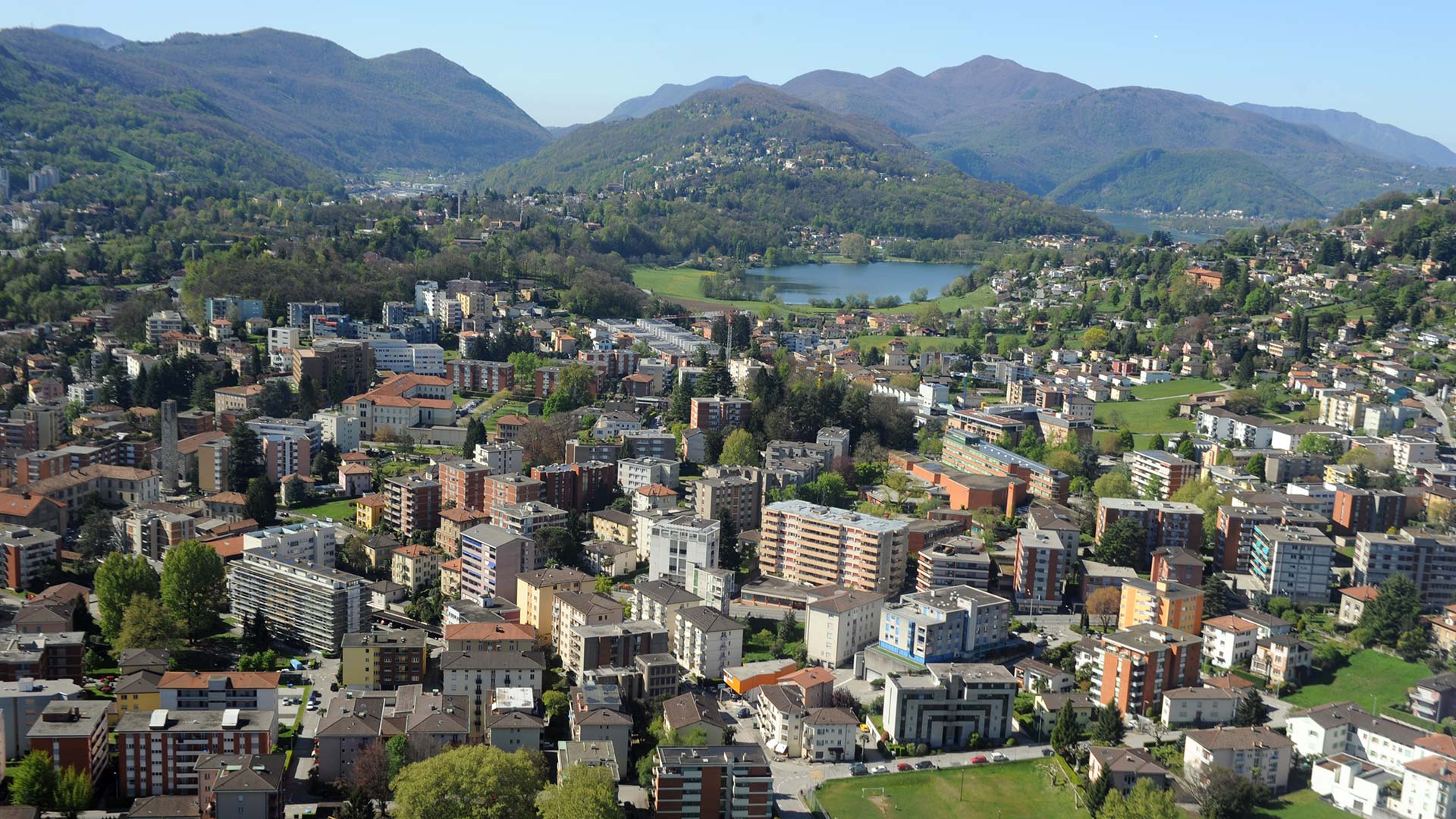 Vista aerea di Massagno – infrastruttura in fibra ottica di Massagno4net a copertura territoriale nel comune di Massagno